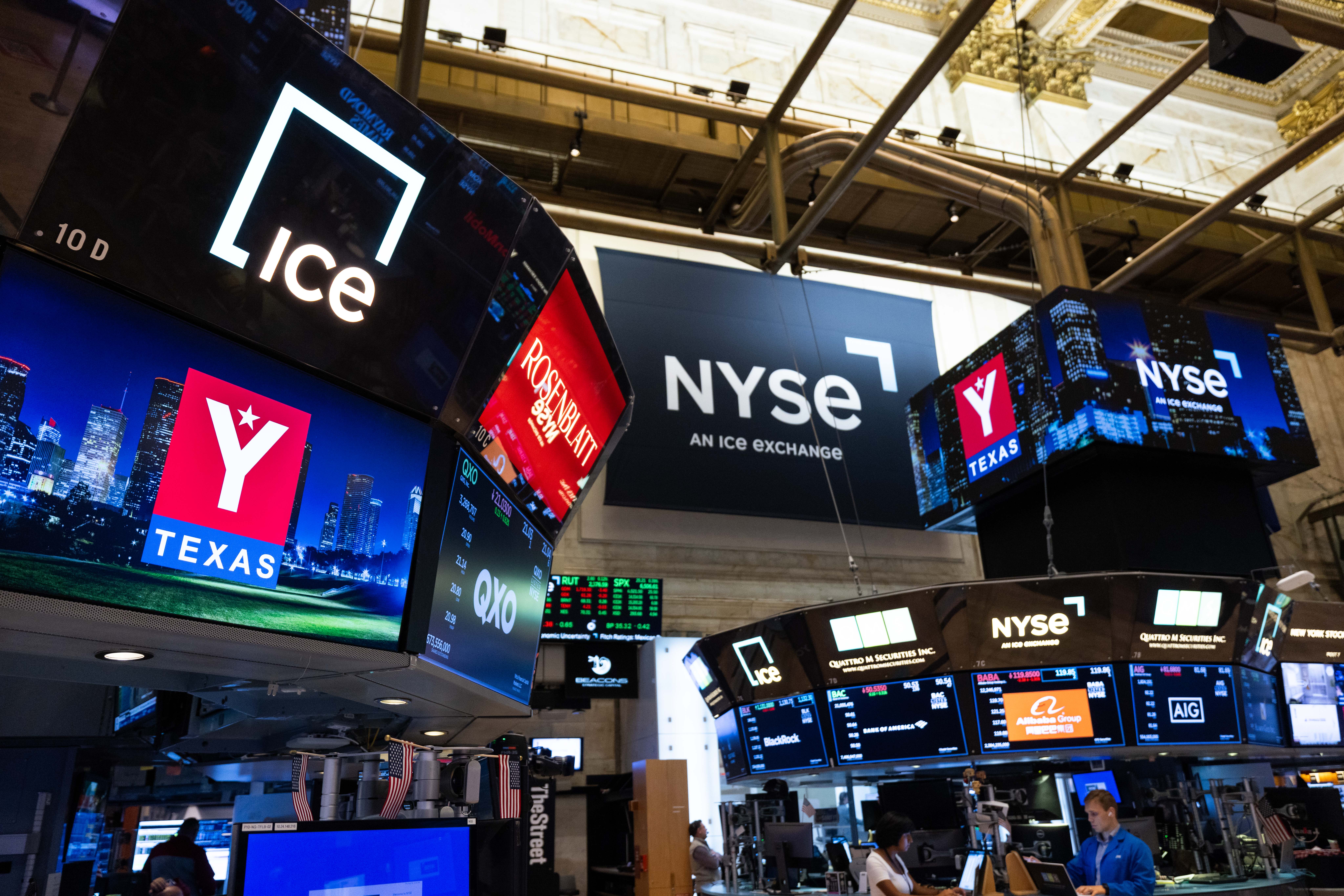 The YTexas logo displayed on the trading floor screens at the New York Stock Exchange